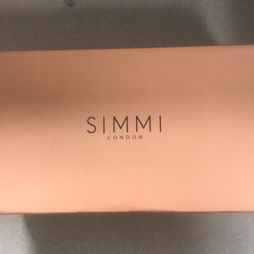 Perplex clear mule heels with gold heel